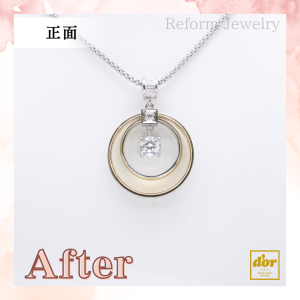婚約指輪と結婚指輪を組み合わせて作った二重リングのペンダントネックレス。中央にダイヤモンドが揺れる華やかなデザイン
