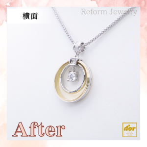 婚約指輪と結婚指輪を組み合わせて作った二重リングのペンダントネックレス。中央にダイヤモンドが揺れる華やかなデザイン